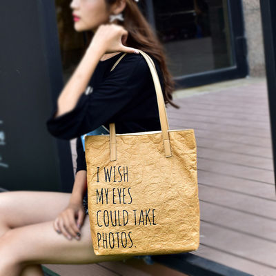 calidad  Recyclable Custom Washable Kraft Paper Bag Shopping Bags Women Handbags Ladies Tote Bag fábrica